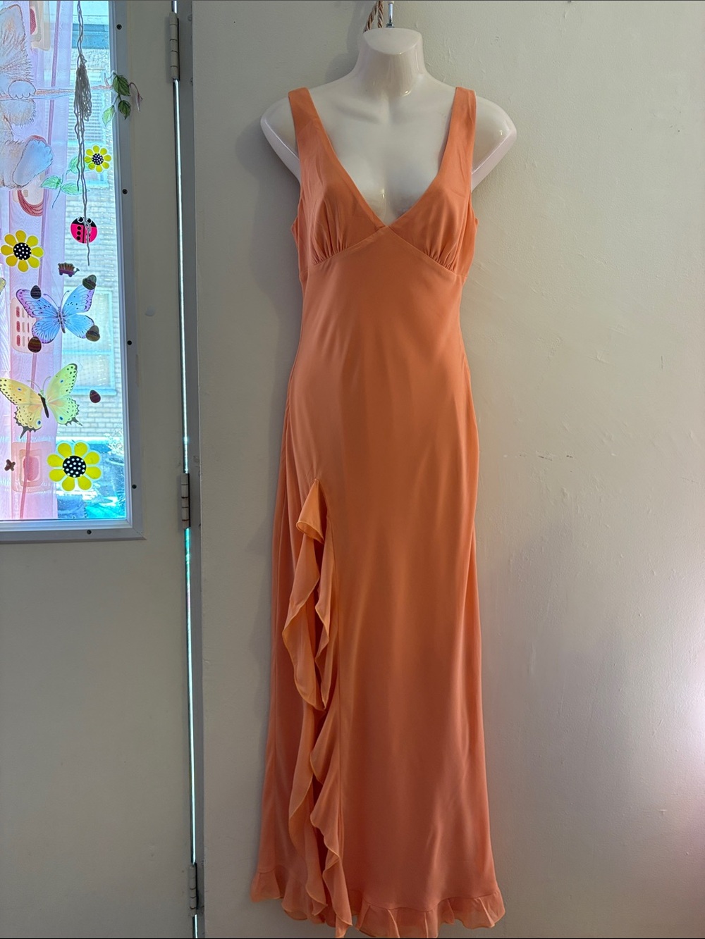 Sleeveless Peach Maxi Dress with Ruffle Cascade.